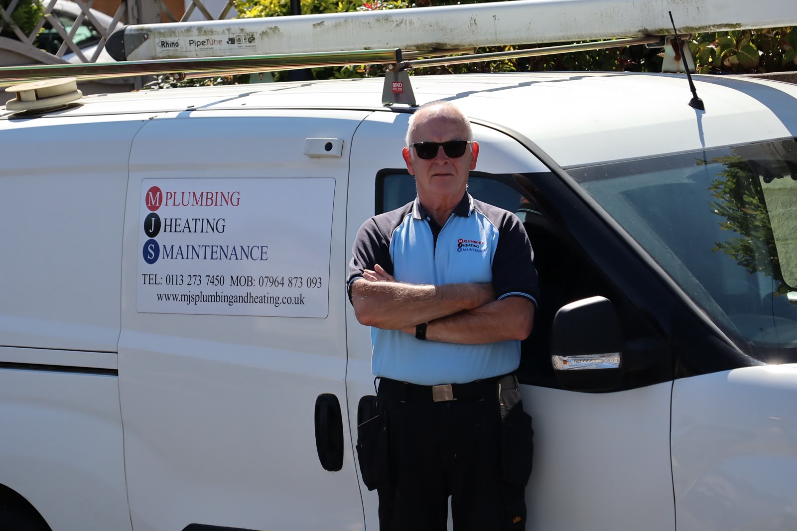 MJS Plumbing and Heating Maintenance plumber with branded van in Shadwell, Leeds